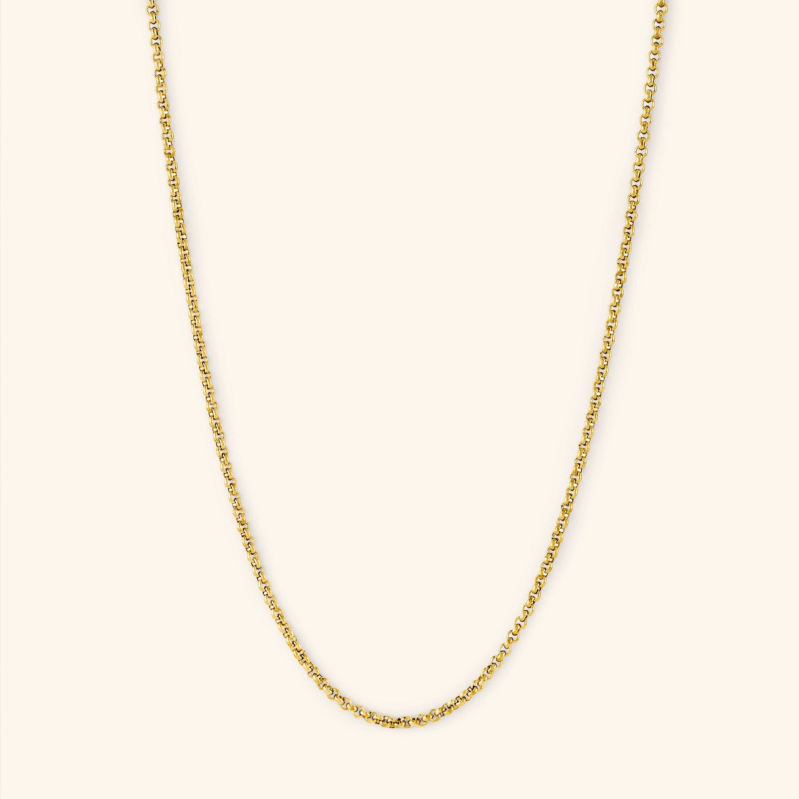 Photo of an 18k gold plated necklace against a light background. The Invisible Box Bracelet features a 1.5MM alternating box-like chain pattern