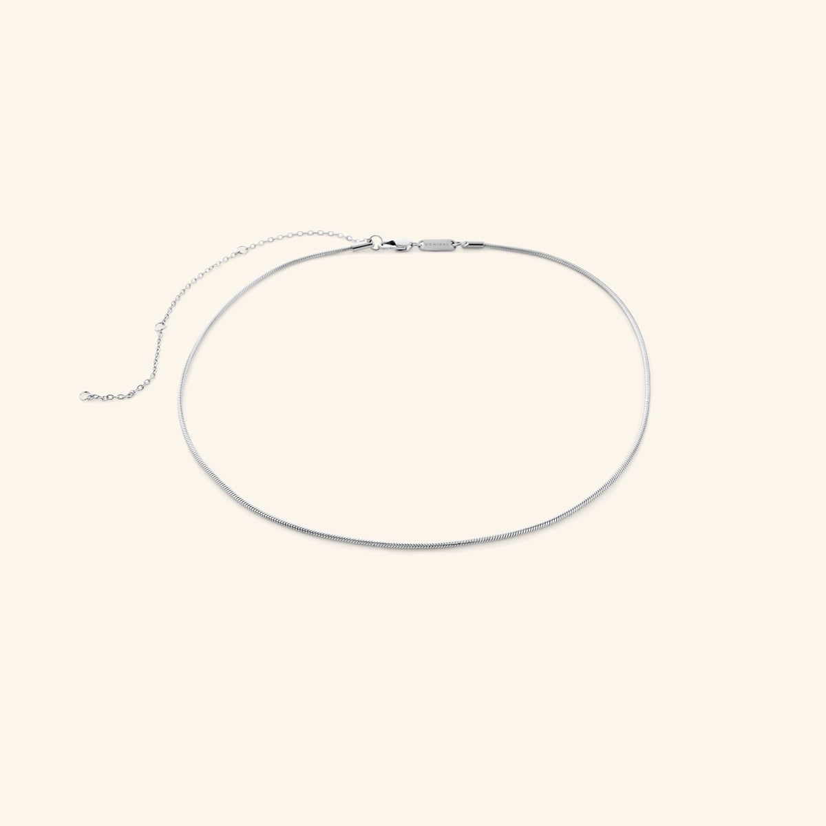 Silver harmony necklace on a white background