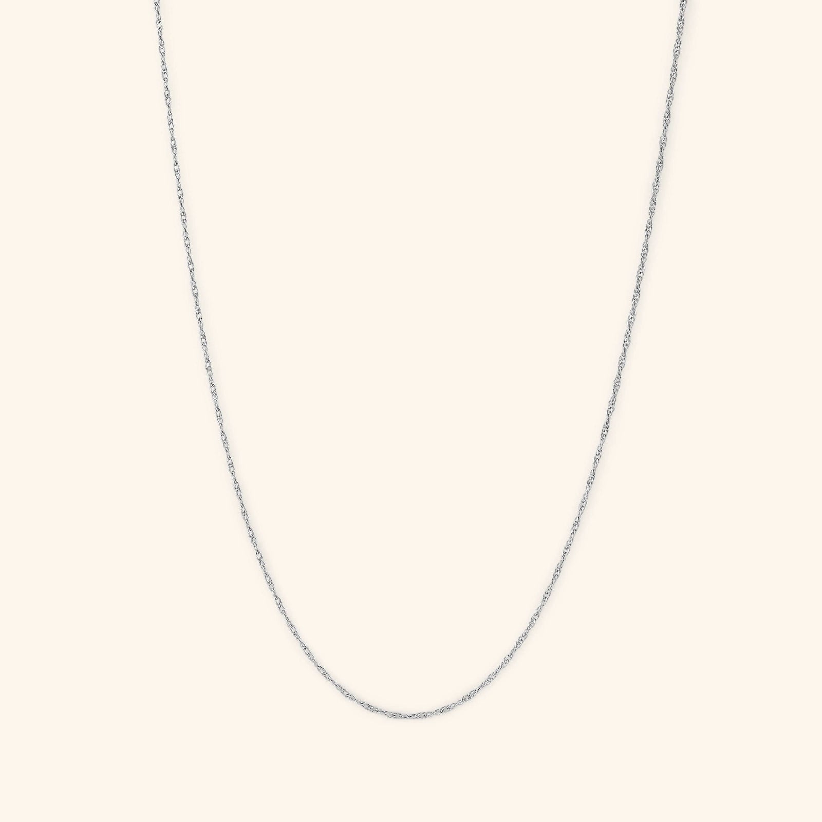 Photo of the silver Micro Twisted Chain. This chain features a 1MM twirling chain pattern 