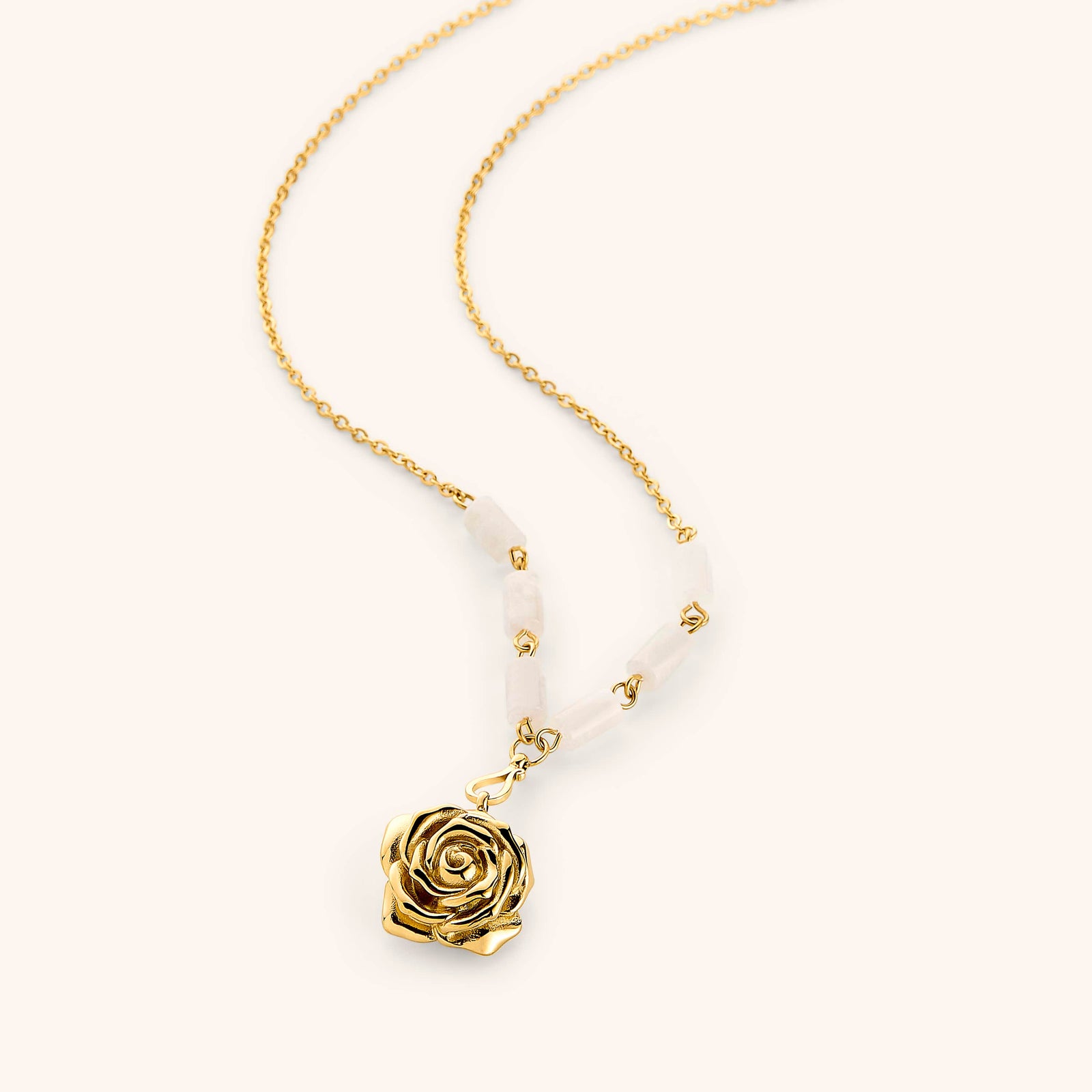 18k gold plated chain necklace with a detailed rose flower pendant and milky white tube beads.