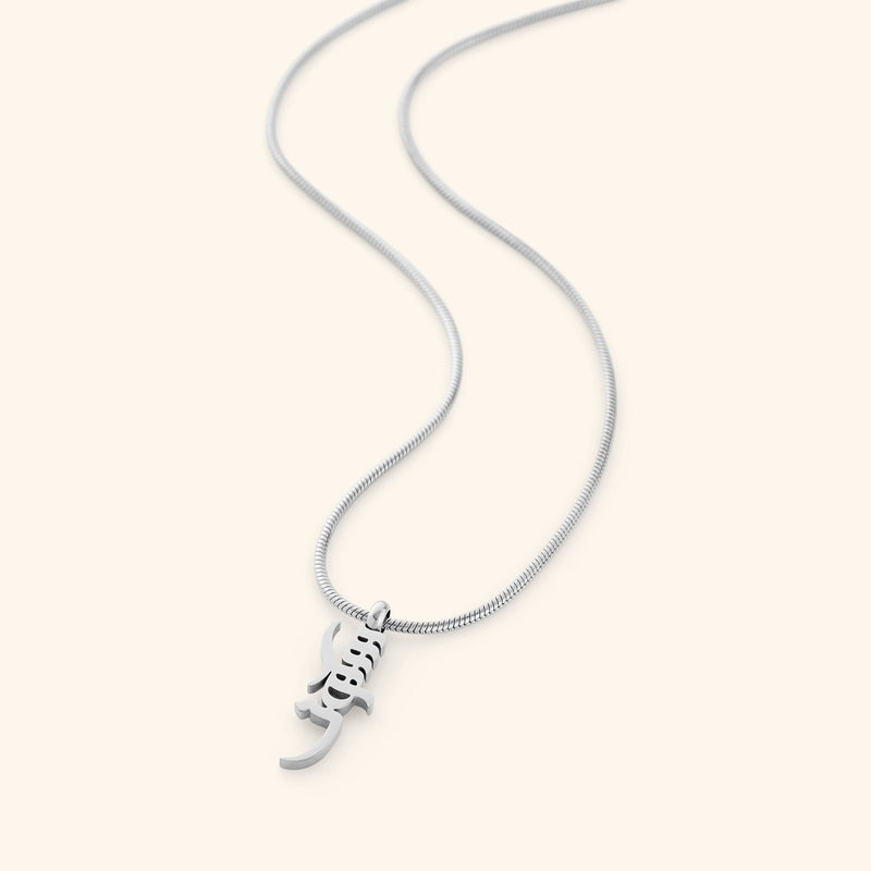 Silver Peace of Mind necklace with a pendant that reads "Sukoon" on a white background