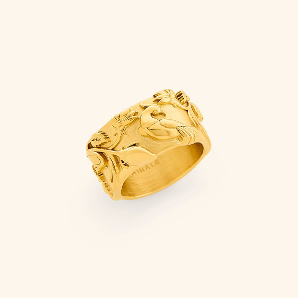 Gold Bengal Bloom ring featuring an intricate raised design.