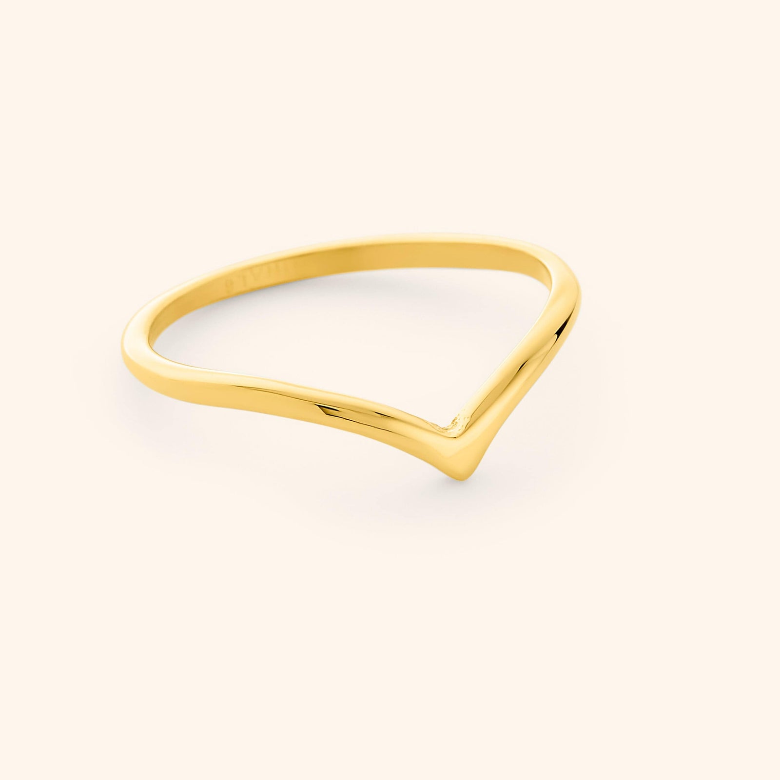 Gold completion ring, displayed on a light background.
