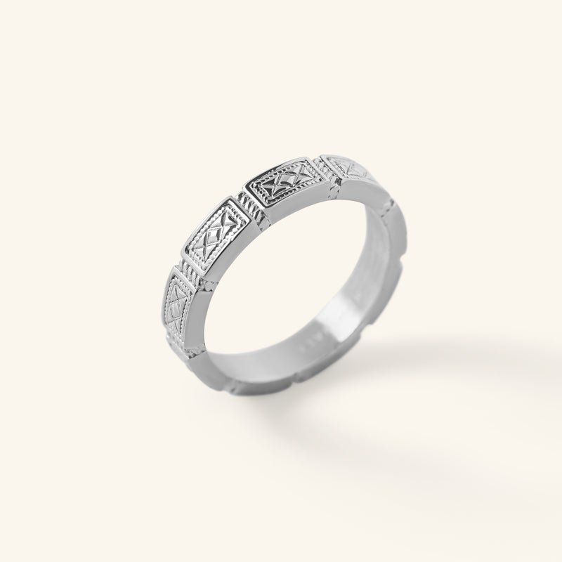 Silver Damascus Tile Ring with repeating engraved tile-style patterns shown against a neutral background.