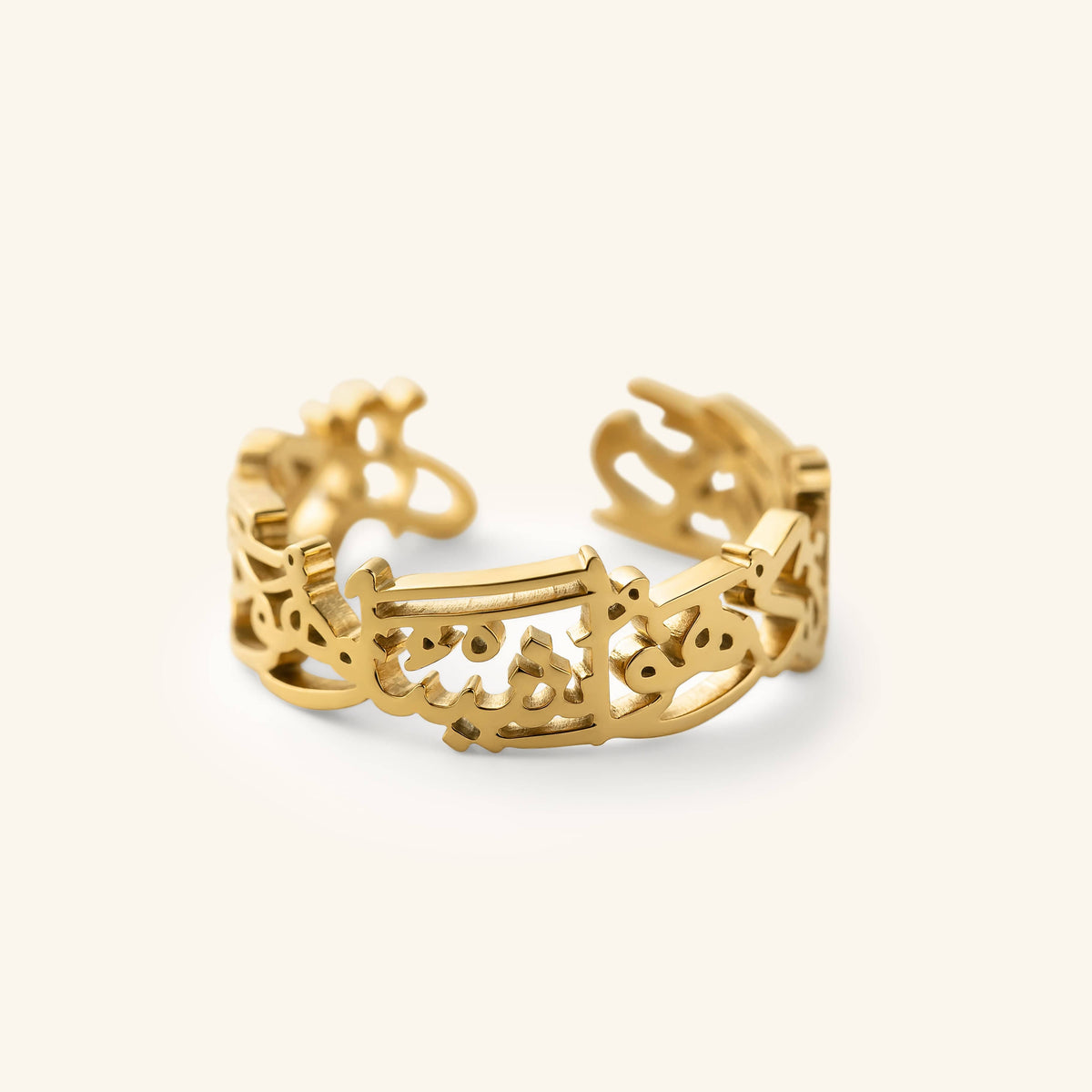 The "Perhaps you dislike something which is good for you" Calligraphy Ring in gold, shown close-up on a neutral background.