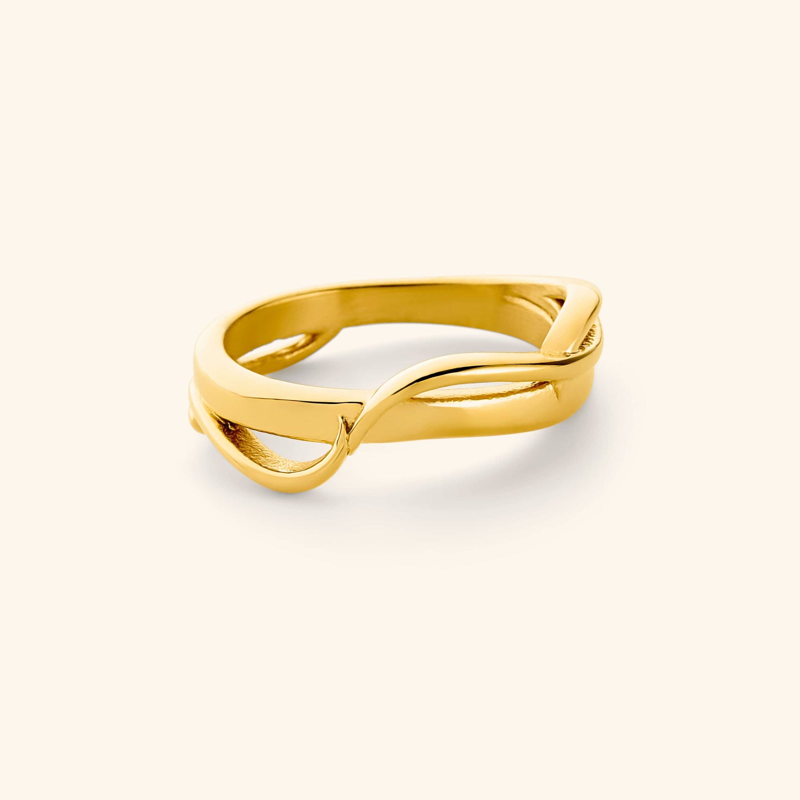 An 18k gold plated ring where two bands intertwine to form the Arabic word for love, حب. 