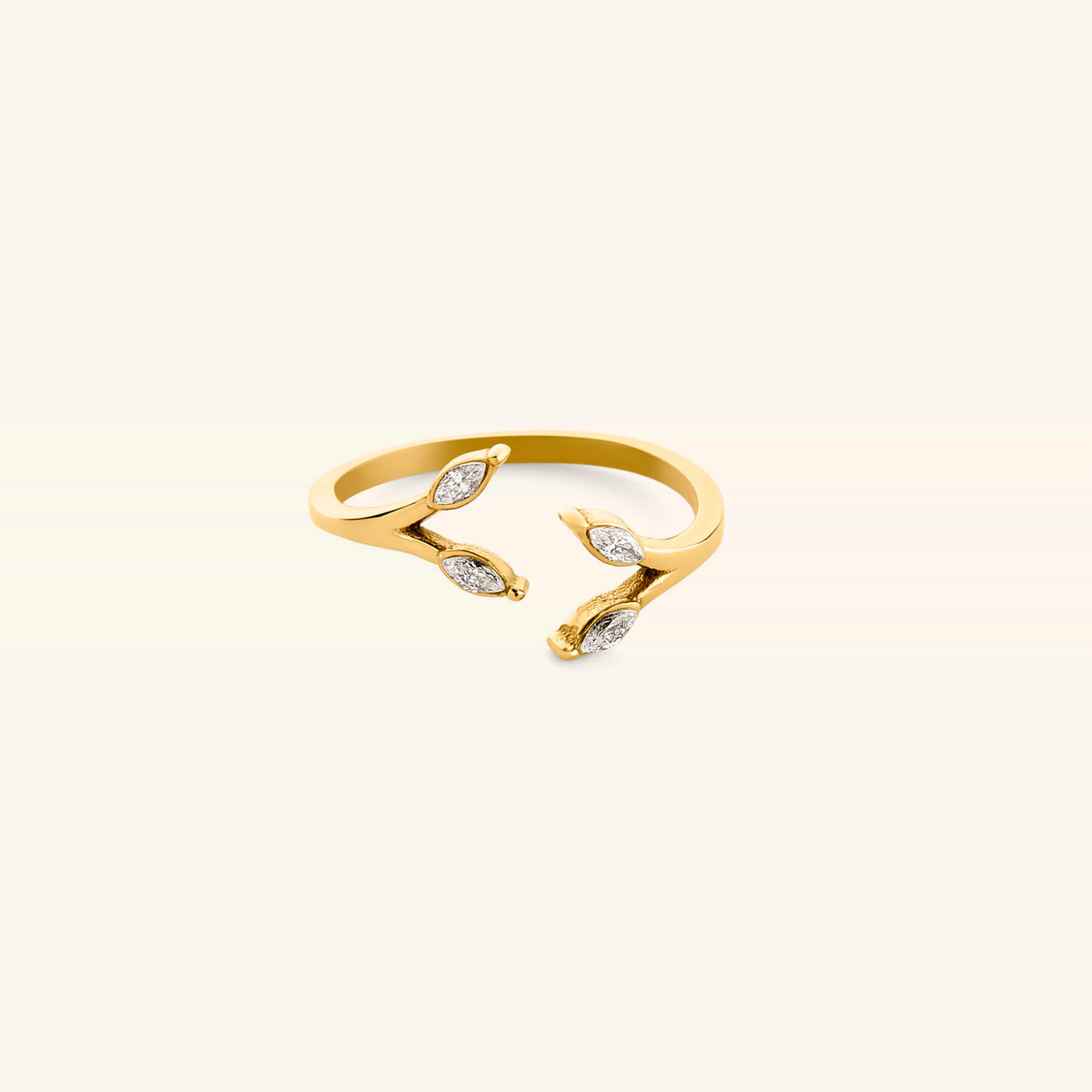 18k gold-plated Olive Branch Marquise Bezel Ring featuring an open band design with clear marquise-cut crystal leaves.