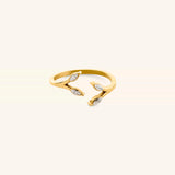18k gold-plated Olive Branch Marquise Bezel Ring featuring an open band design with clear marquise-cut crystal leaves.
