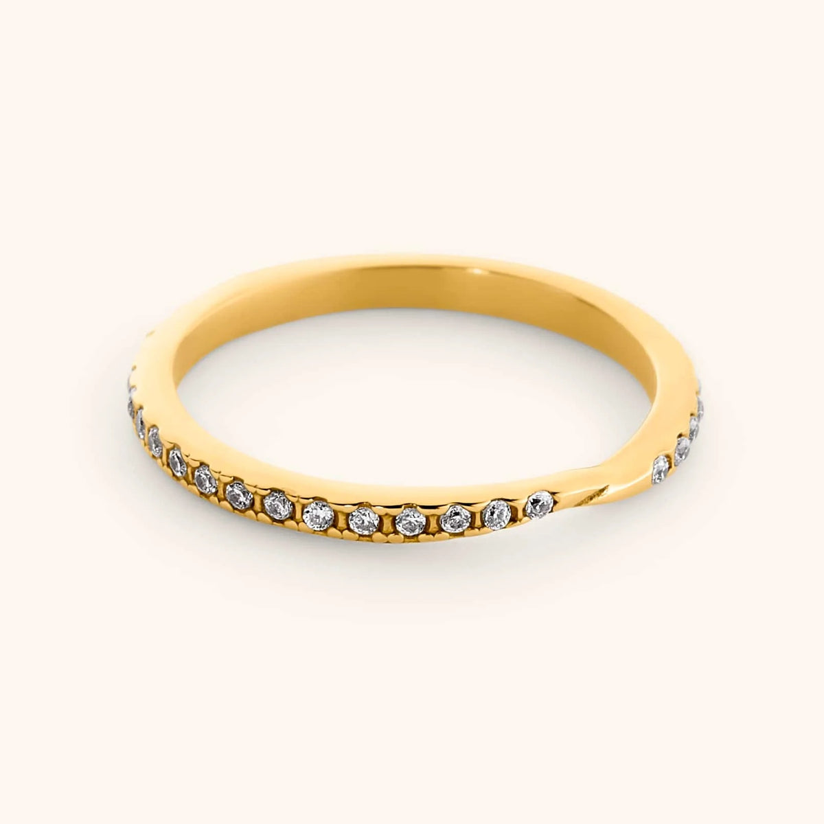 18k gold-plated Bezel Band featuring a delicate, gently contoured band set with a continuous row of clear pavé crystals.