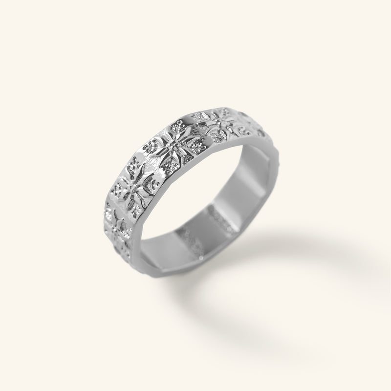 Silver Tatreez Ring with raised tatreez-inspired detailing shown against a neutral background.