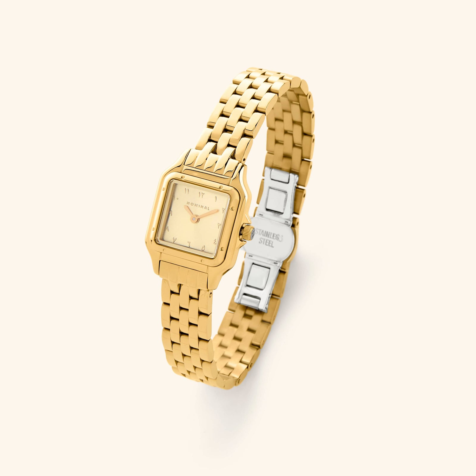 Photo of the Golden Hour watch featuring a monochromatic gold finish with a rectangular face.