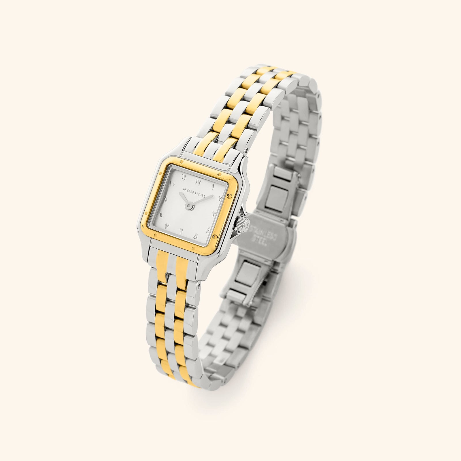 A two-tone silver and gold combination with a rectangular face and a monochromatic face.
