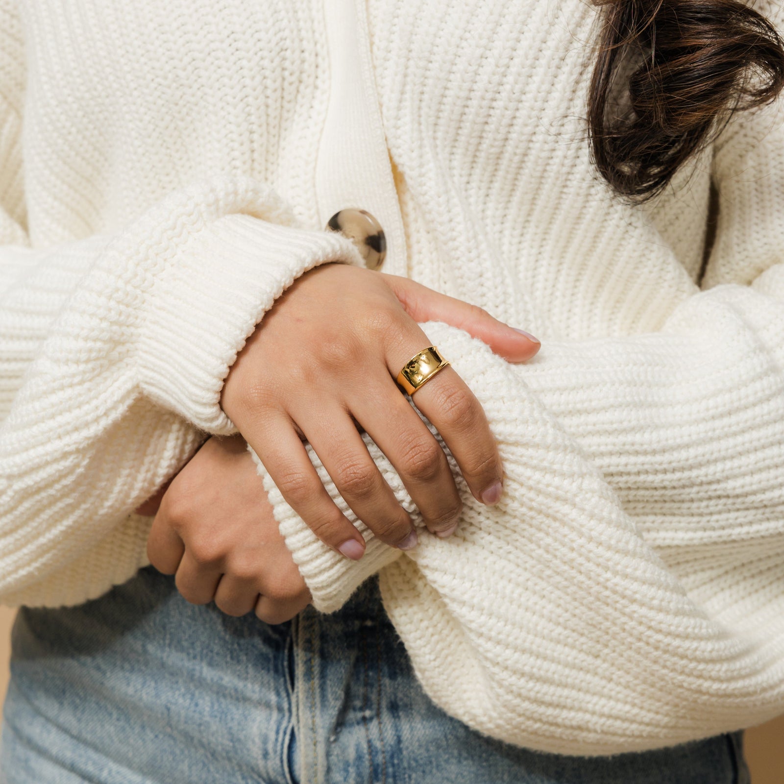 Woman  wearing a gold Chunky Melt Ring