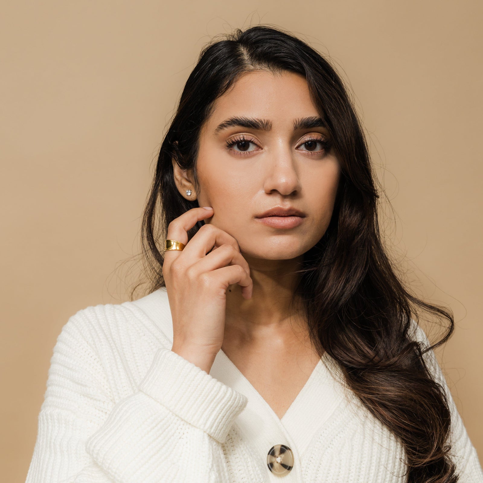 Woman wearing the gold Chunky Melt Ring