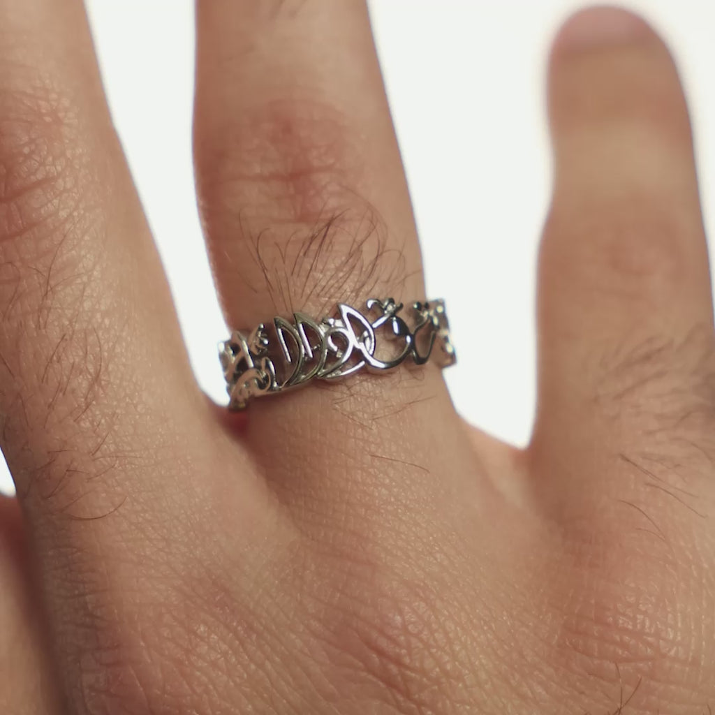 Model moves their right hand to show the silver "Walk to Me and I'll Run to You" Calligraphy Ring | Men. The model adjusts the silver ring on their finger.