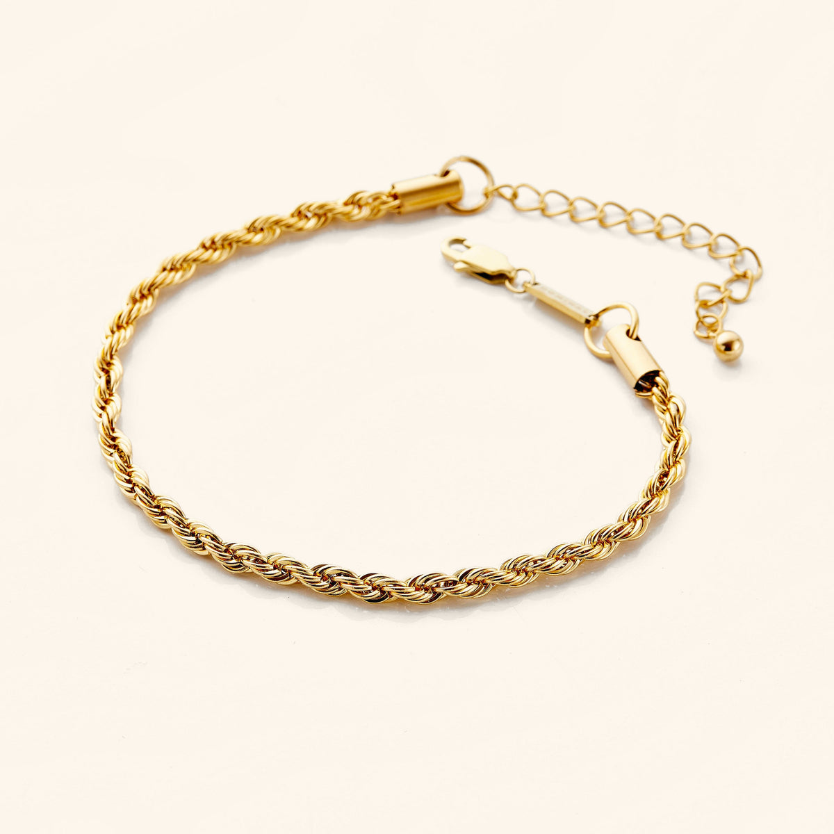 Gold rope chain anklet with lobster clasp and extension chain, displayed on a white background.