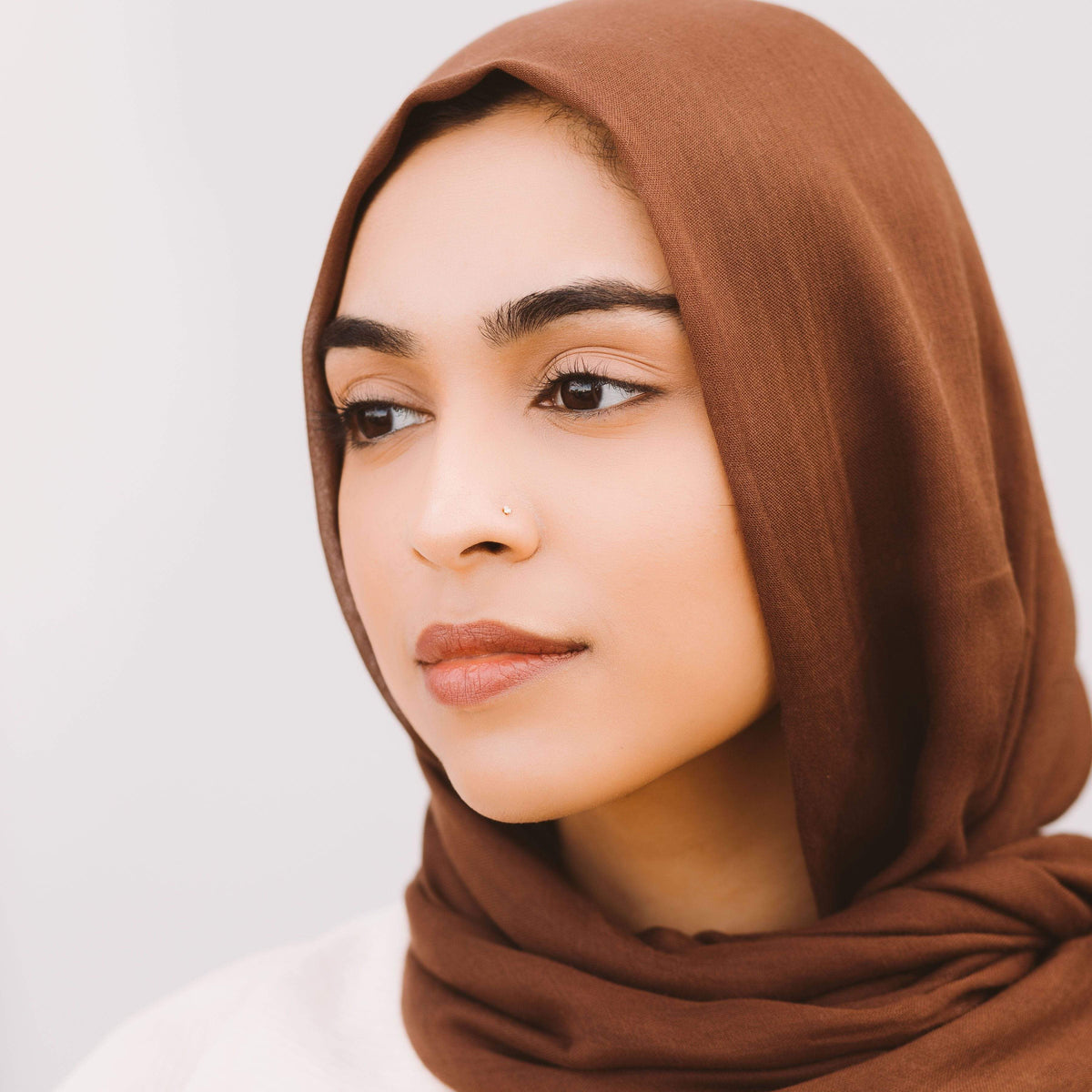 The Circle Nose Stud as worn by the model.
