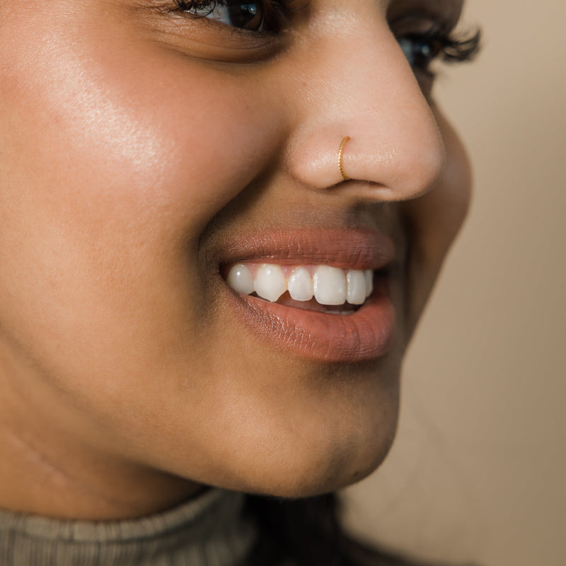 A Beautiful Woman with Nose Piercing · Free Stock Photo