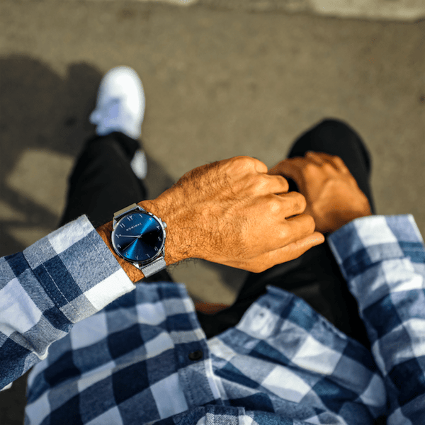 Photo of the Neptune watch as worn by the model on their left wrist