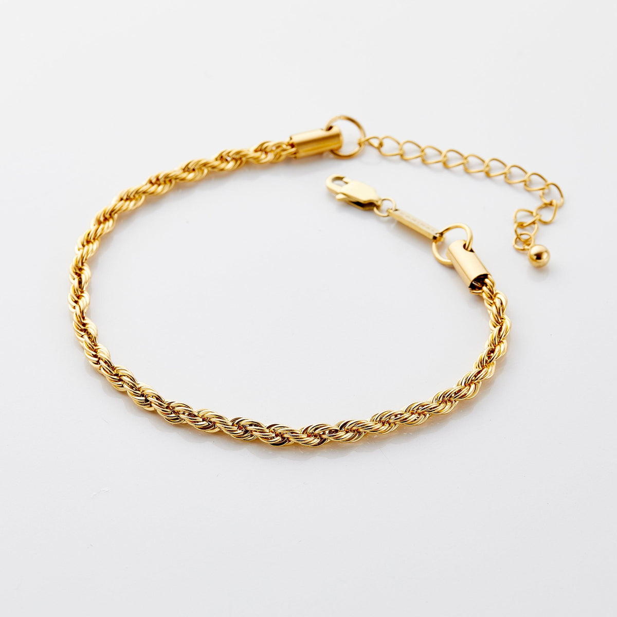 Gold rope chain anklet with lobster clasp and extension chain, displayed on a white background.
