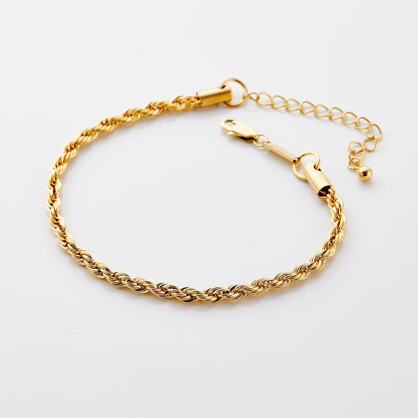 Gold rope chain anklet with lobster clasp and extension chain, displayed on a white background.